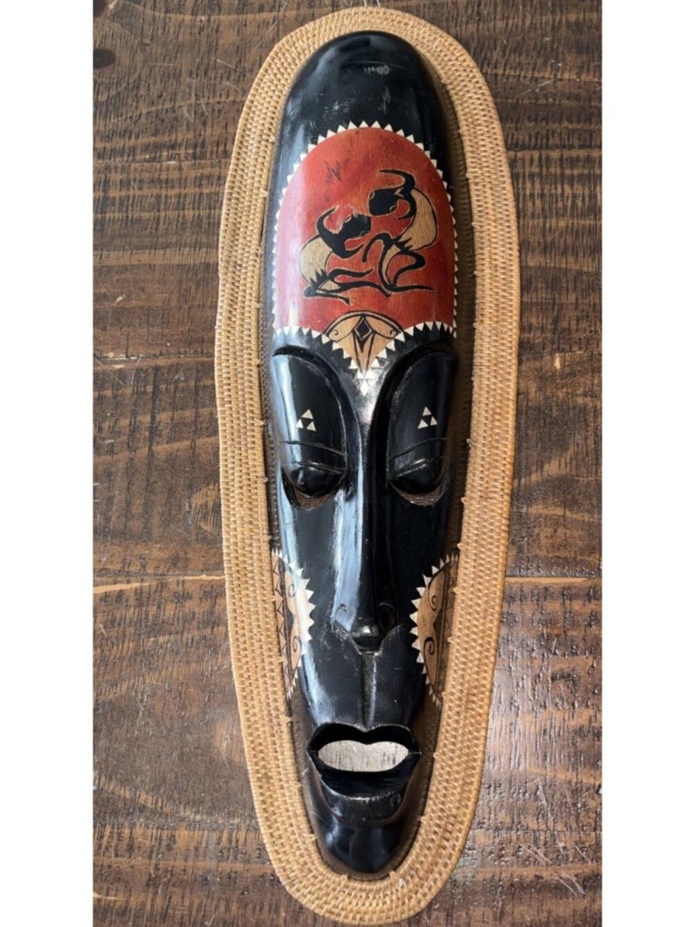 Unique Indonesian Mask 22”L x 7.5”W Black & Rust Oval Shape w/woven rattan Edge